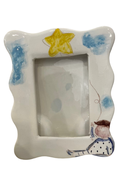 Cornice ceramica bimbo